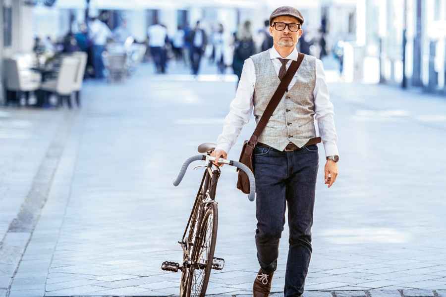 Gothaer Dread Disease Versicherung: Mann mit Fahrrad